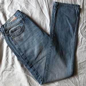 Vintage slightly faded light wash men’s jeans. Waist: 30, length: 32.